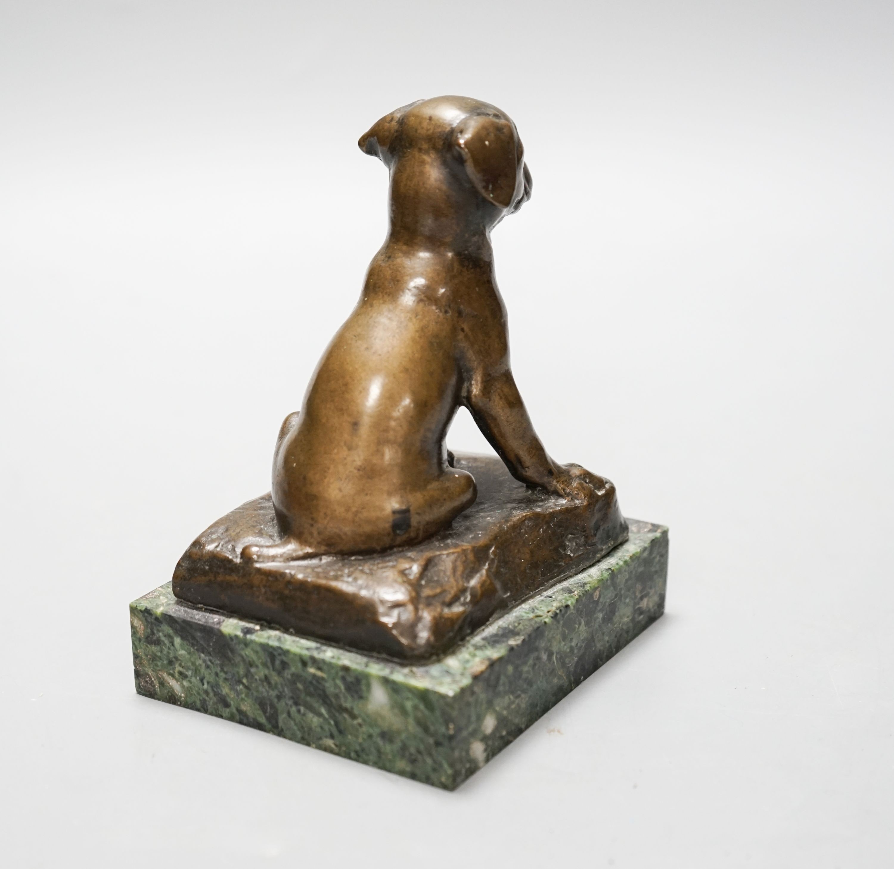 An early 20th century bronze figure of a seated puppy, 13cm